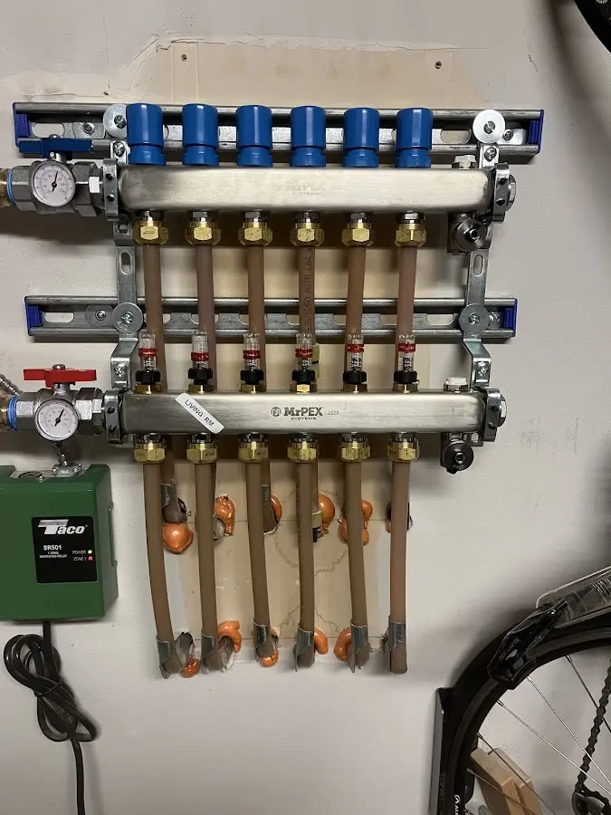 Plumber performing Water Heater Repair at a residential property in Doney Park